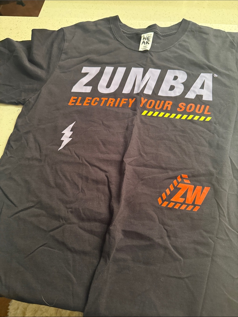 Zumba Fitness Black Short-Sleeve Tee with White and Orange Graphics